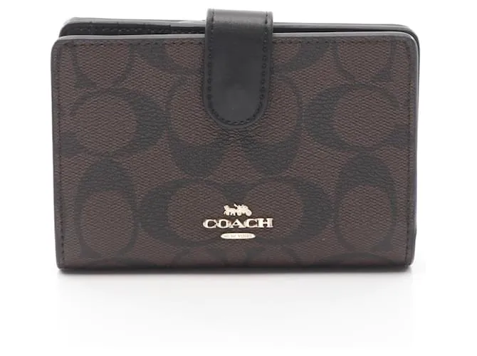 Portafoglio in PVC di pelle diagonale Signature Coach Marrone