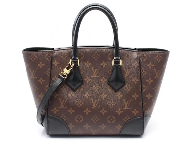 Borsa a mano Monogram Phoenix PM Louis Vuitton Marrone