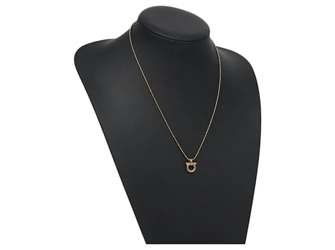 Collana Gancini Salvatore Ferragamo in metallo dorato Auth 125845