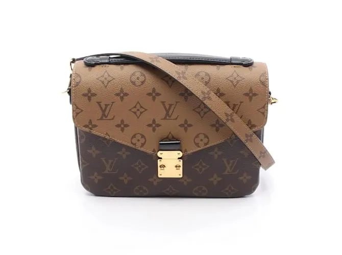 Borsa a mano Louis Vuitton Metisse MM Pochette Marrone Nero