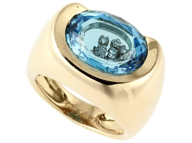 Autre Marque Anello Manhattan in oro giallo K18 con topazio blu e diamanti D'oro