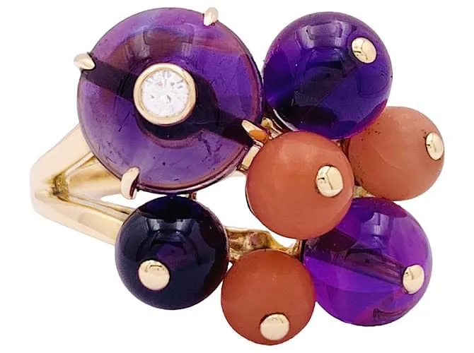 Anello Cartier, "Delizie di Goa", oro giallo, diamante, corallo, ametiste.