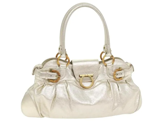 Borsa a mano Gancini in pelle Salvatore Ferragamo, tono oro, autentica 91343AV D'oro