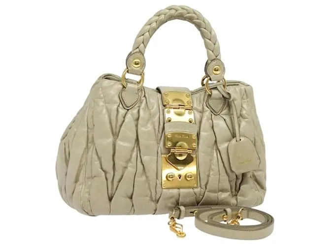 Borsa Miu Miu Matelassé in pelle 2 in 1 beige oro Auth sw579V D'oro