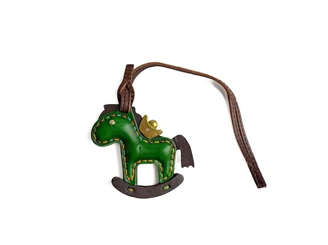 Autre Marque Cavalli a dondolo in pelle multicolore