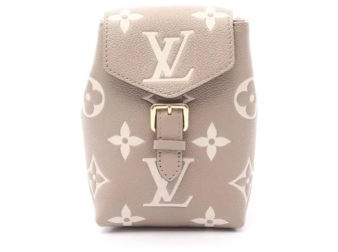 Zaino Tiny Monogram Empreinte Louis Vuitton Marrone Beige