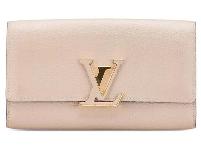 Portafoglio in pelle Capucines di Louis Vuitton Marrone Beige