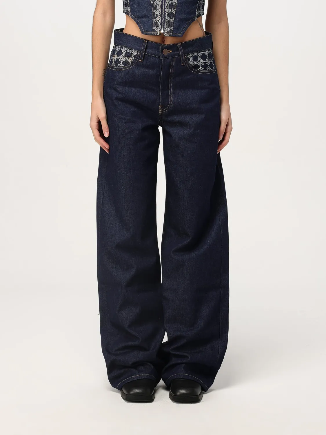 Jeans flared in denim di cotone Amiri