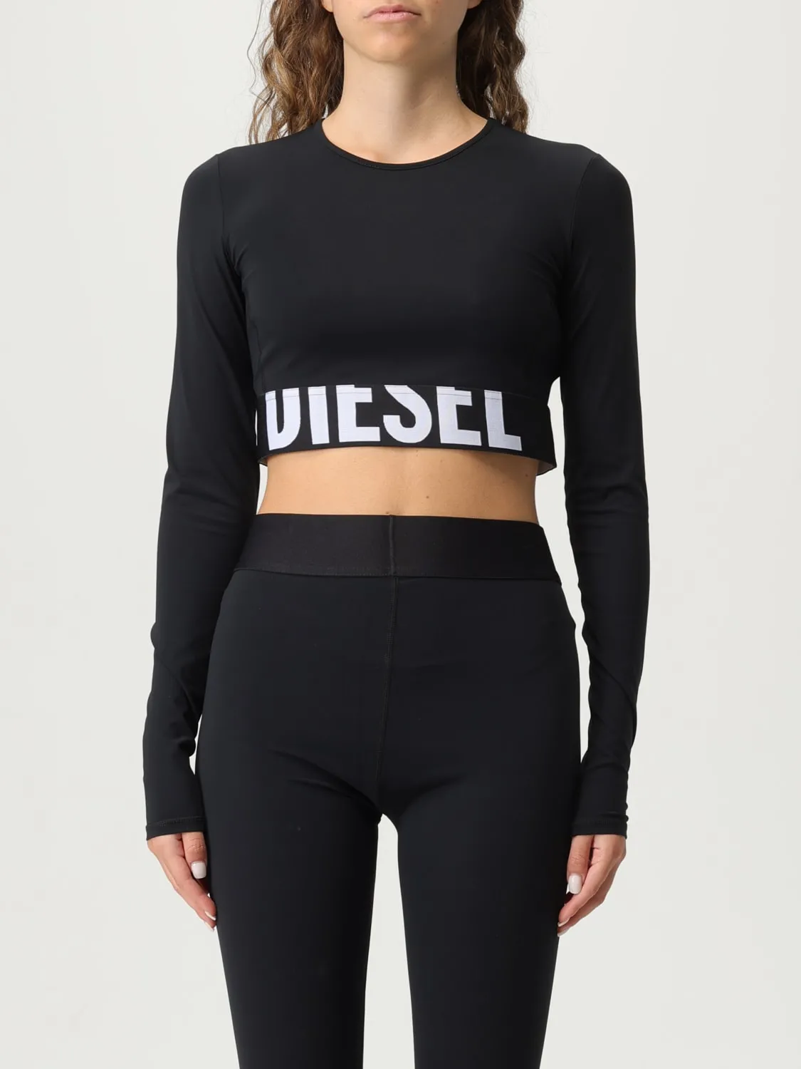 Top cropped Diesel in tessuto tecnico stretch