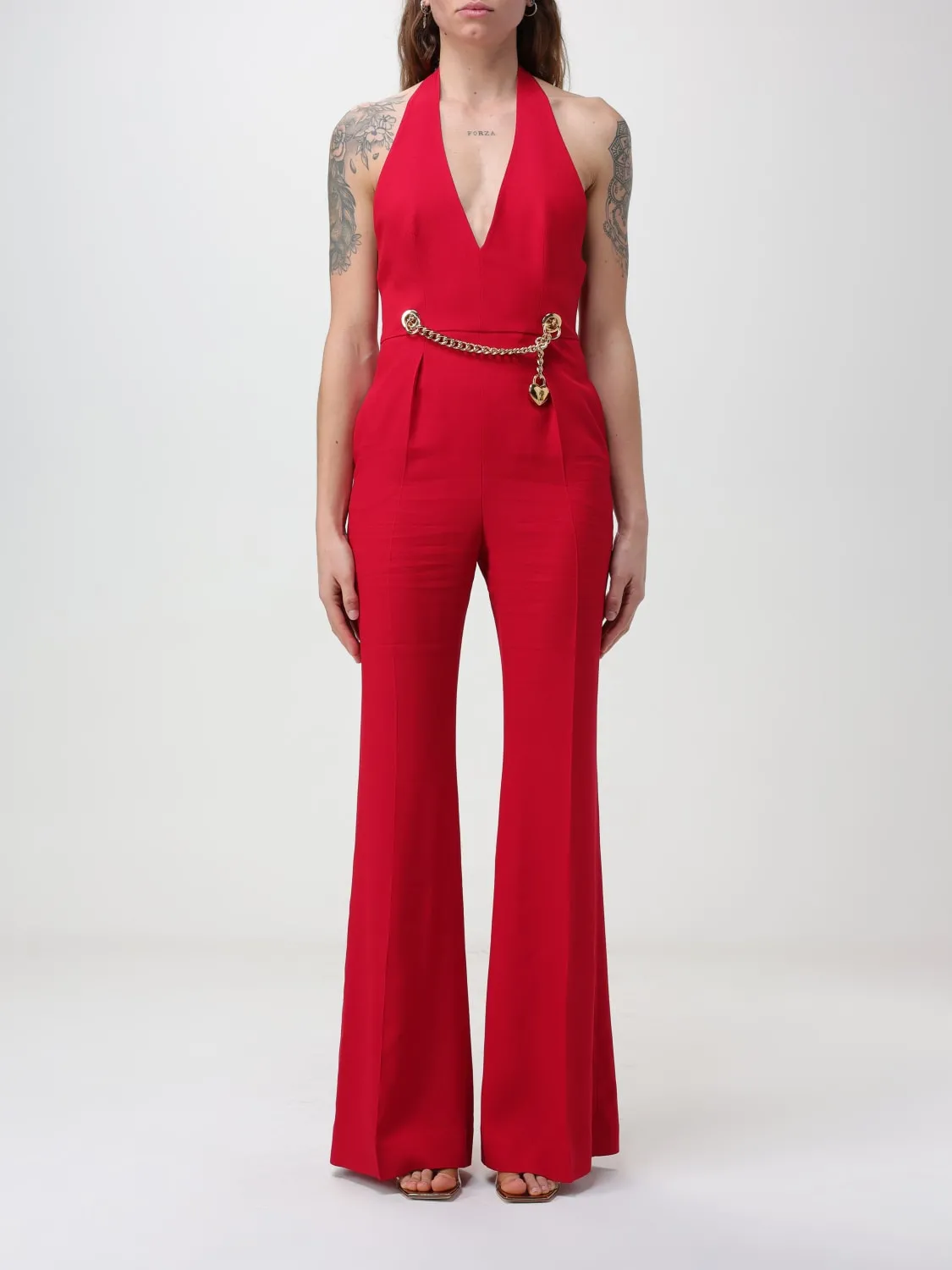 Tuta Moschino Couture con maglia metallica